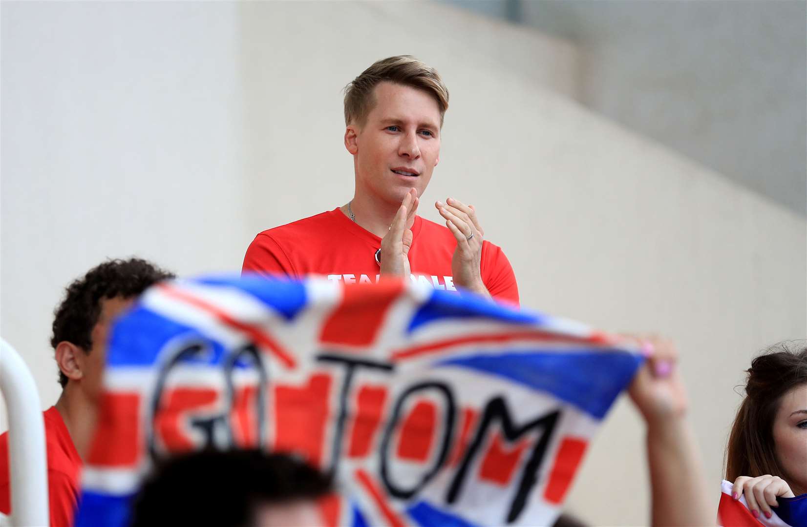 Dustin Lance Black supporting Tom Daley at the Rio Olympic Games in 2016 (PA)