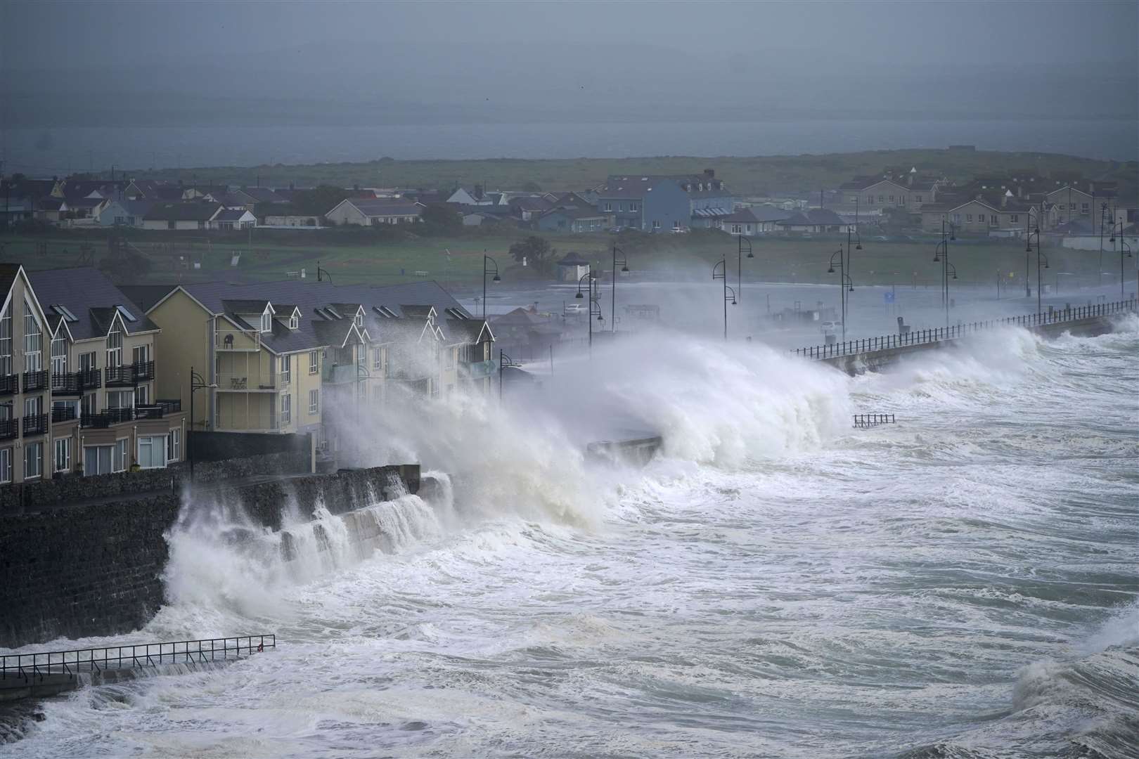 Waves at high tide in Tramore, County Waterford, as Storm Agnes hit the UK and Ireland in late September bringing heavy winds and rain and causing damage to buildings, power outages and travel disruption (Niall Carson/PA)