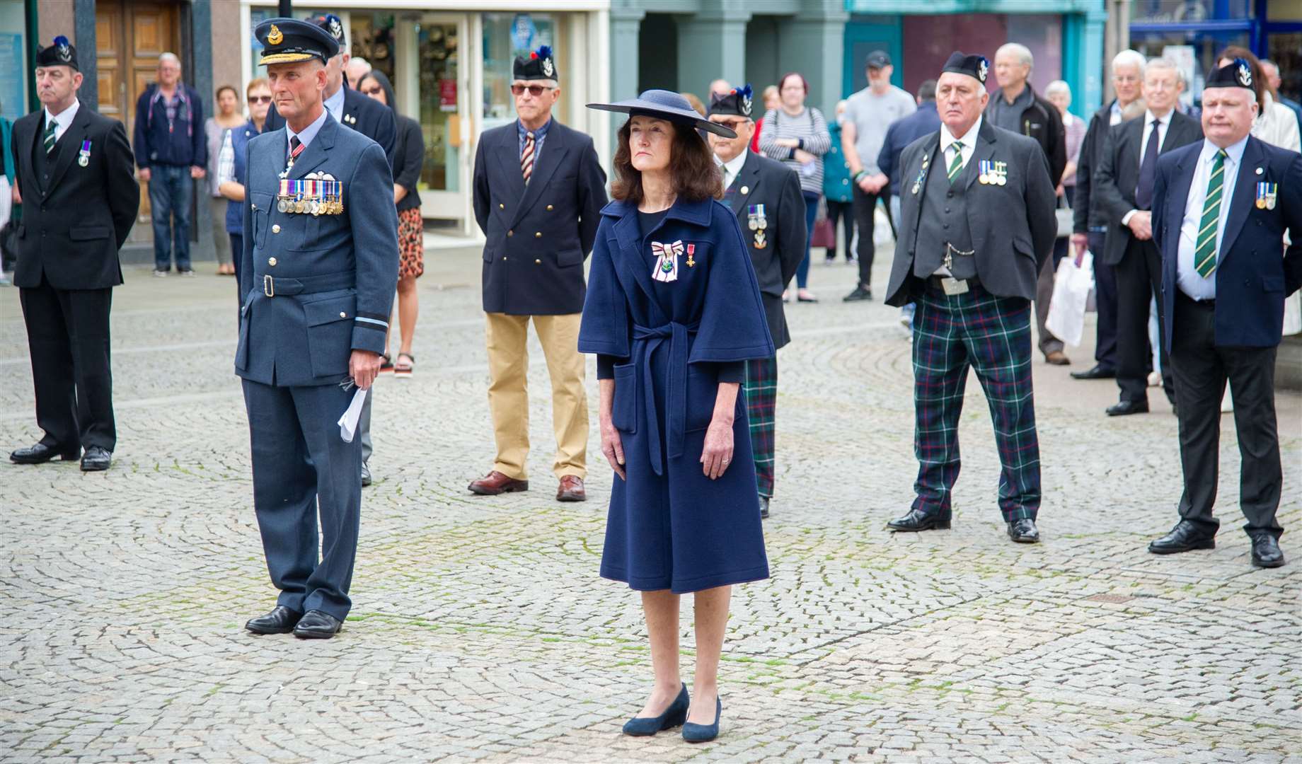 Vice Lord-Lieutenant Nancy Robson salutes the war memorial during the service at Elgin's Plainstones on Saturday to commemorate the 75th anniversary of Victory over Japan (VJ Day). Picture: Daniel Forsyth.