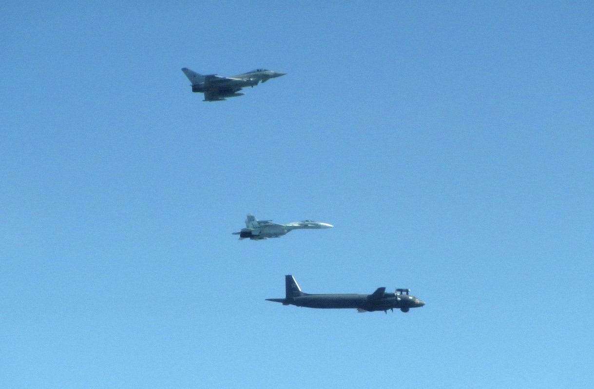 A Russian IL-38 May and SU-27 Flanker B aircraft are intercepted by a RAF Typhoon.