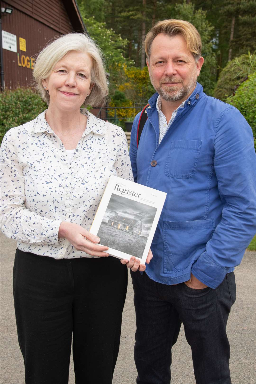 Moira Dennis and Paul Heartfield with a copy of their new book. Picture: Daniel Forsyth