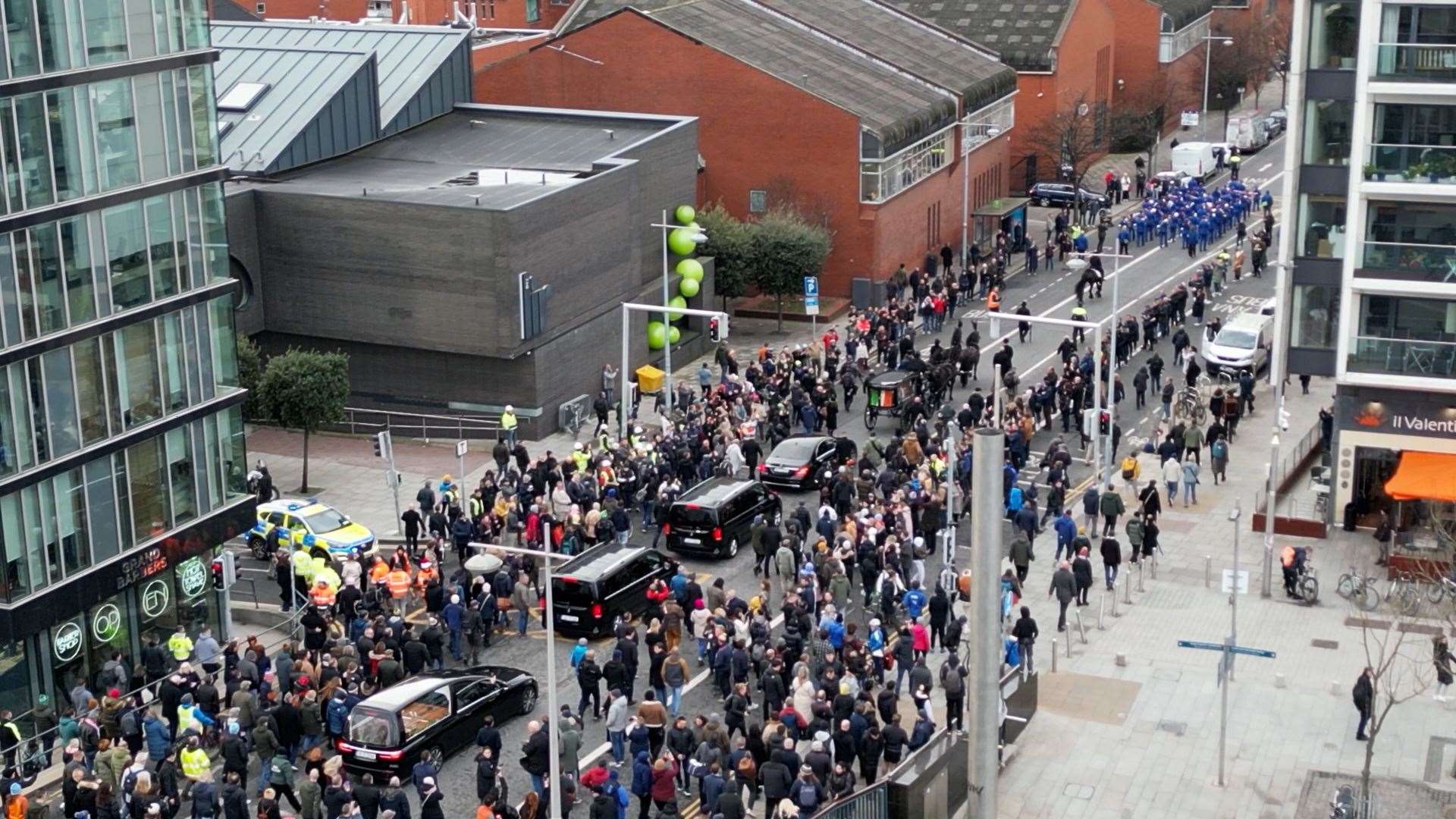 MacGowan’s funeral procession crosses Mac Mahon Bridge in Dublin (Niall Carson/PA)