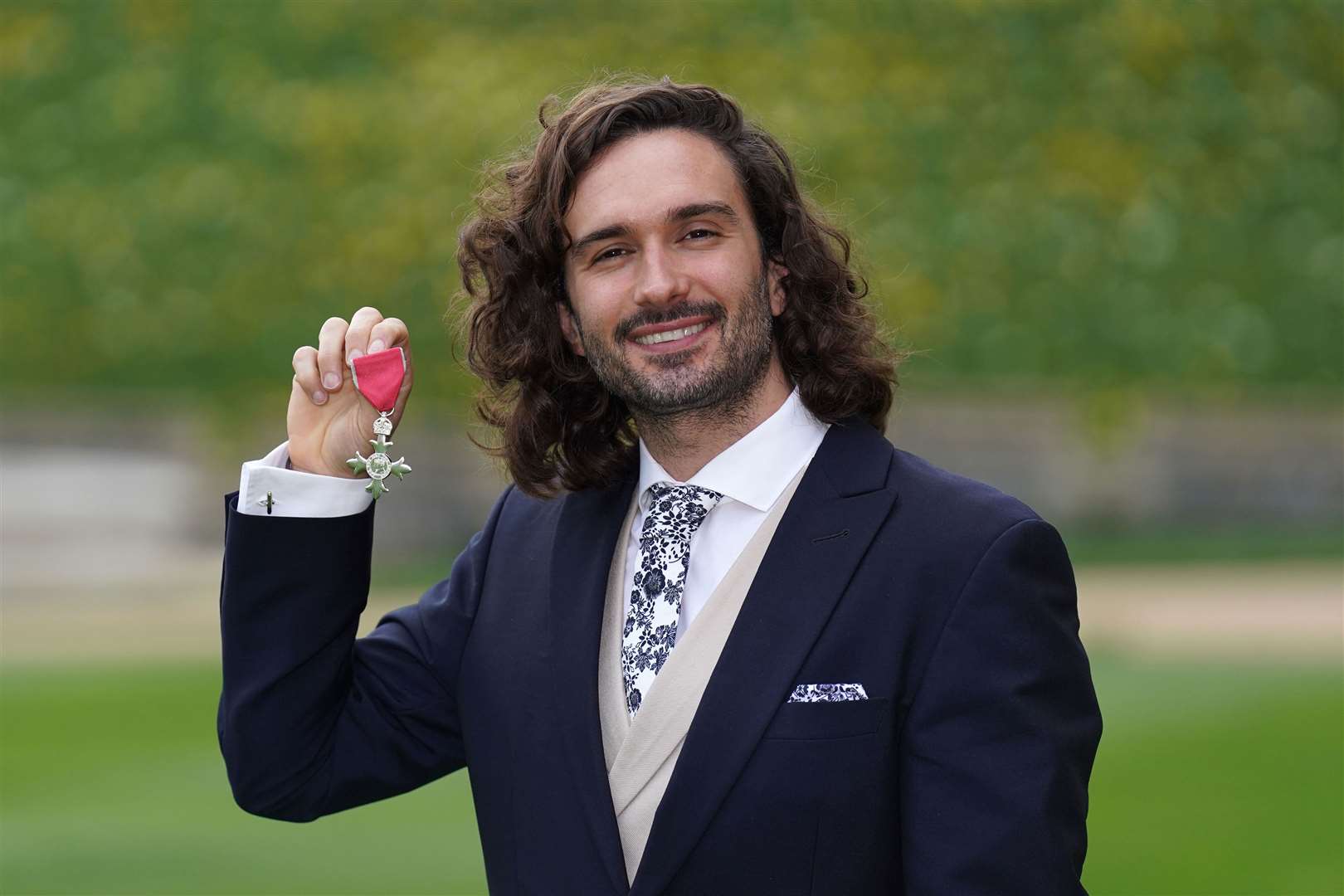 Joe Wicks, pictured, after receiving his MBE medal from the Princess Royal in March (Steve Parsons/PA)