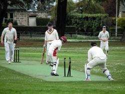St Lawrence's Durance bowls Highland's Hussain during their encounter at Grant Park on Saturday
