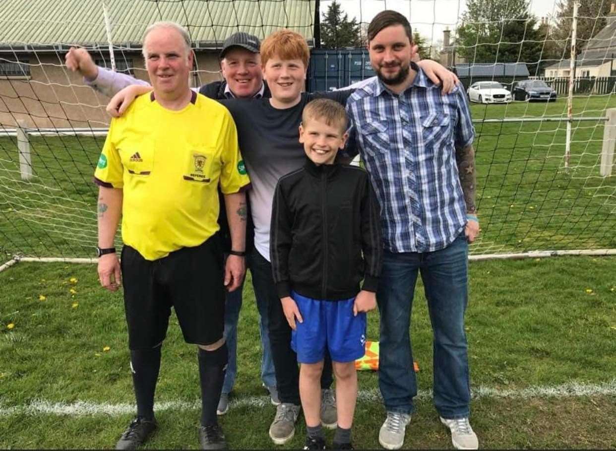 Duncan (left) running the line at Forres Thistle, with brother Callum, andsons Keith, Finlay and Kyle who plays for Mechanics U16s.
