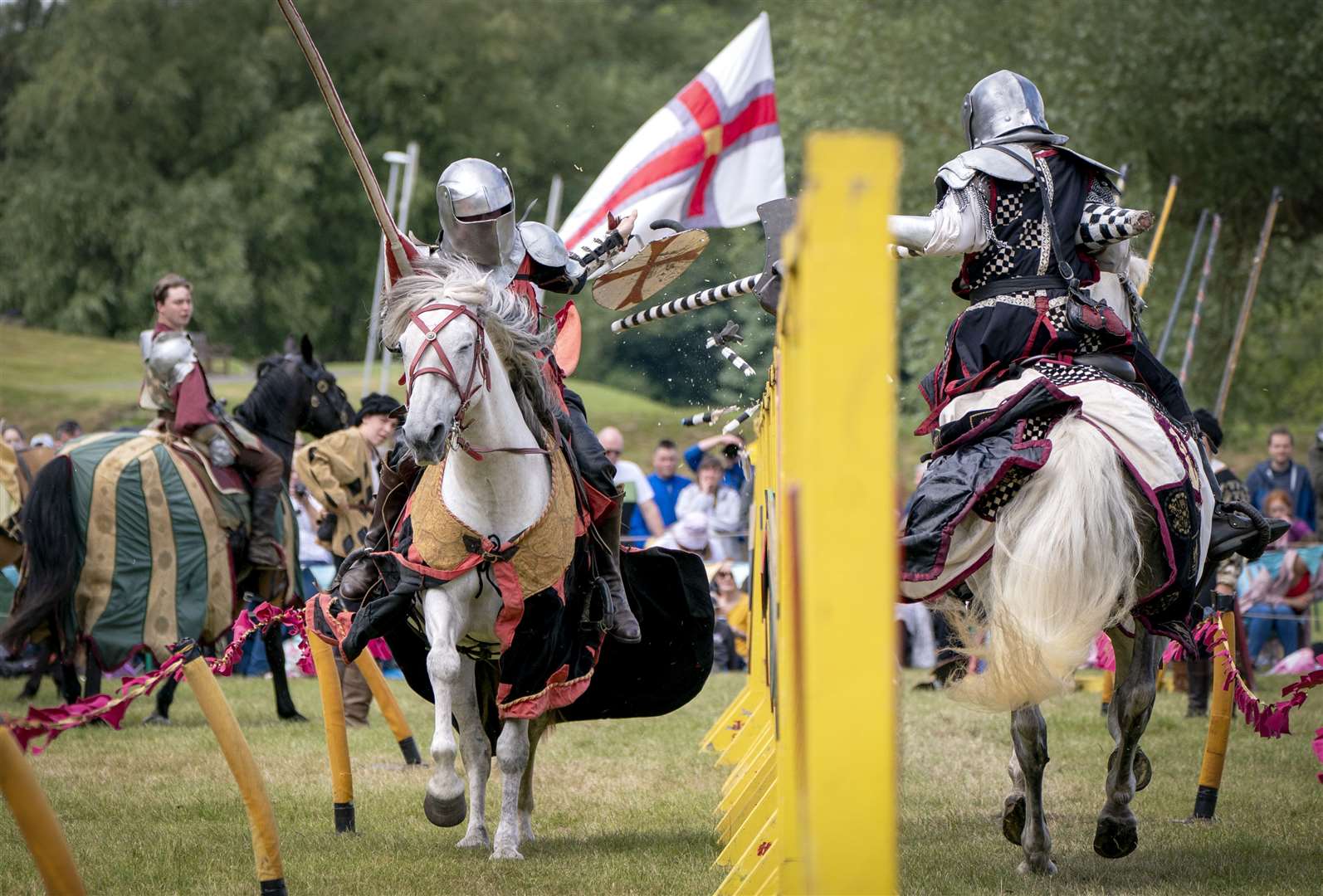 Participants in full armour brace during a charge at the annual jousting tournament at Linlithgow Palace in West Lothian (Jane Barlow/PA)