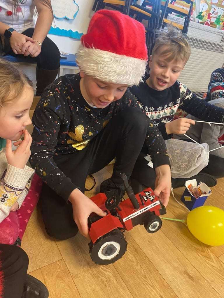Secret Santa made Fergus a Massey Ferguson tractor.
