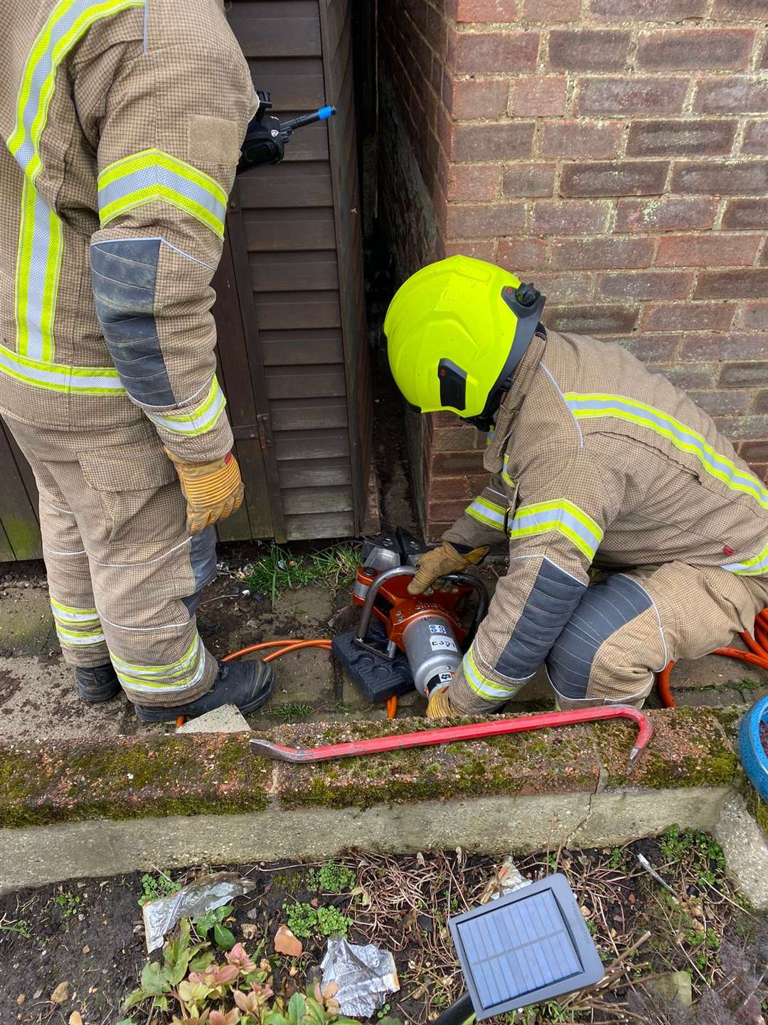 Firefighters used a crowbar and power tool to free the trapped puppy (Essex County Fire and Rescue Service/PA)