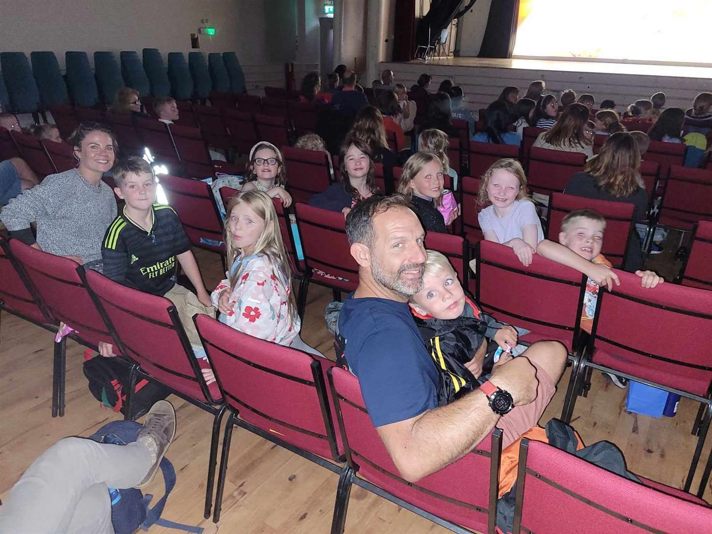 Anderon's Primary School pupil Skye Hughes (8), her parents and party of friends enjoying ‘Bad Guys’ at Film Forres after an audience of 96 sang her Happy Birthday.