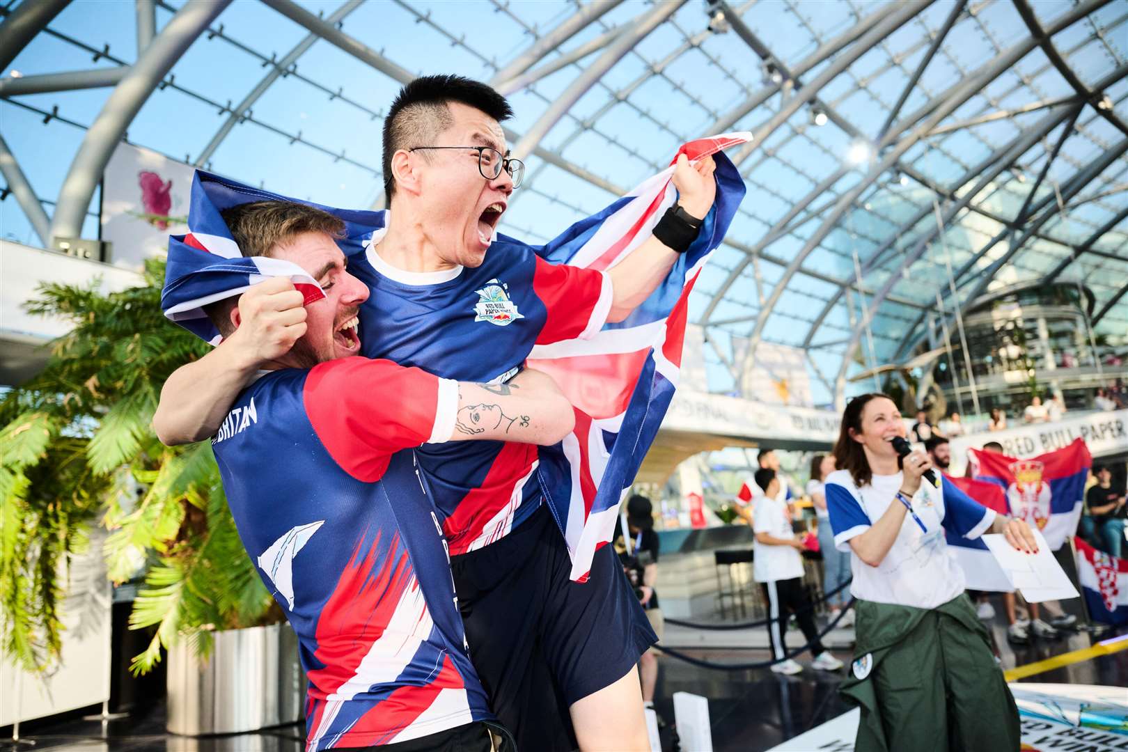 Yicheng Sun of Great Britain celebrate with his team (Red Bull Paper Wings)