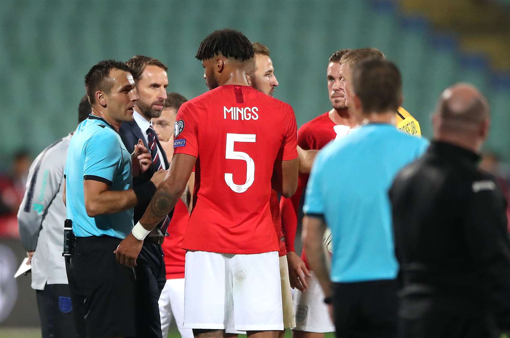 Match referee Ivan Bebek (left) speaks to England manager Gareth Southgate and Tyrone Mings over racist chants from fans during the Euro 2020 qualifying match in Bulgaria (Nick Potts/PA)