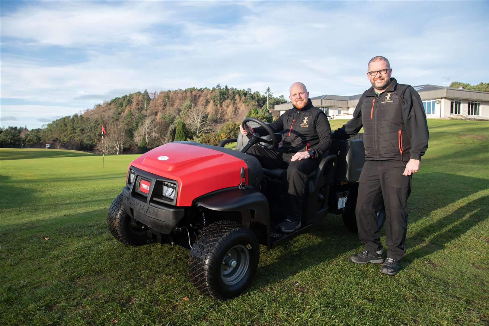 Greenkeepers Andrew Leslie (left) and Ross Macleod still love working on the course after quarter of a century. Picture: Daniel Forsyth