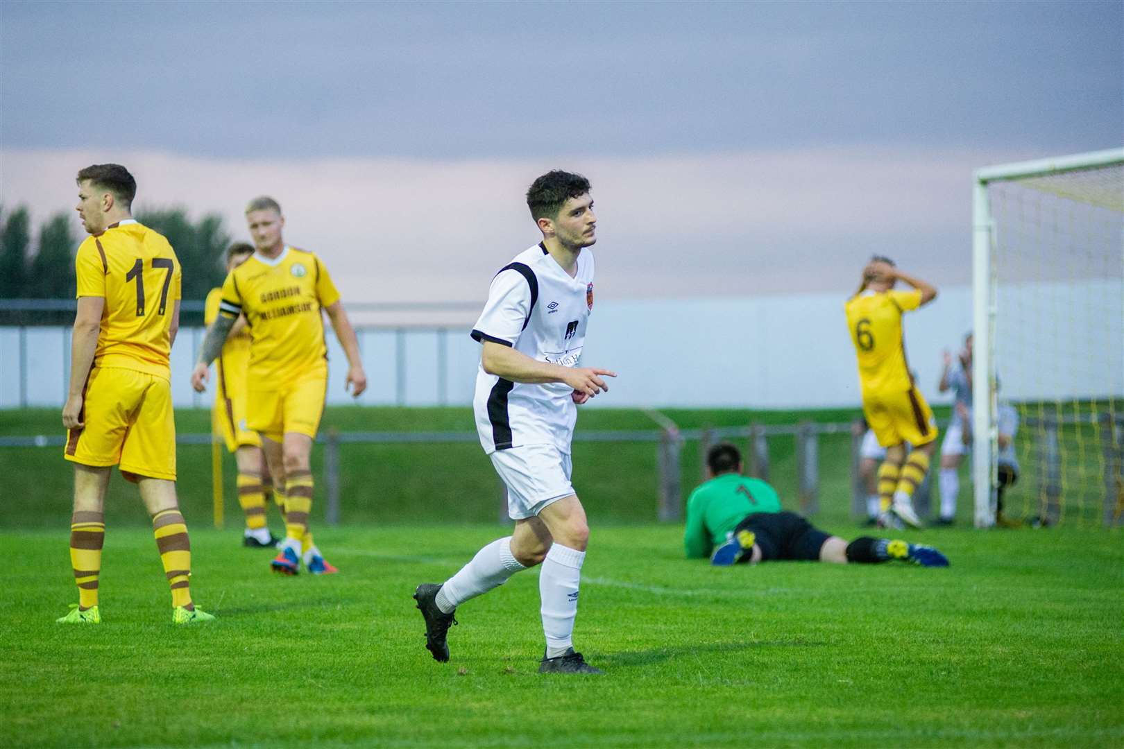 Rothes' Jack Brown fired home this Speysiders second goal of the evening...Forres Mechanics (0) vs Rothes FC (3) - North of Scotland Cup - Mosset Park, Forres 04/08/2021...Picture: Daniel Forsyth..