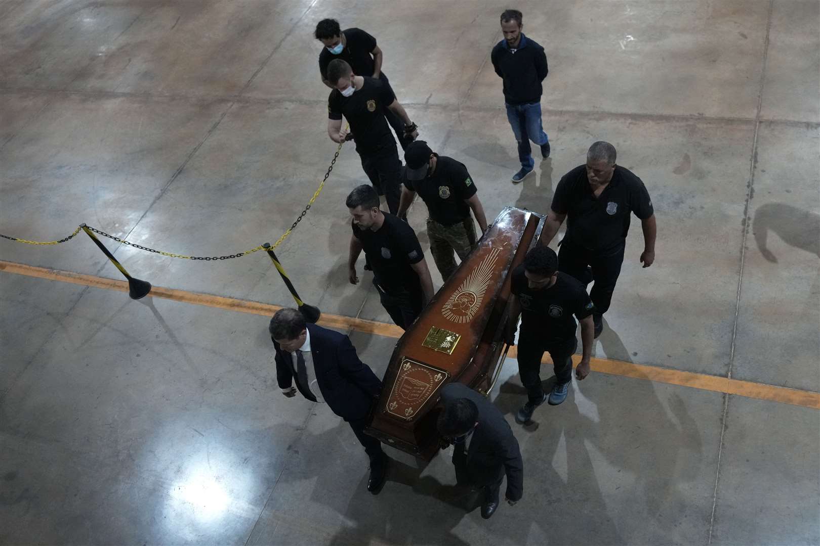 Police have taken the bodies to Brasilia [Eraldo Peres/AP)