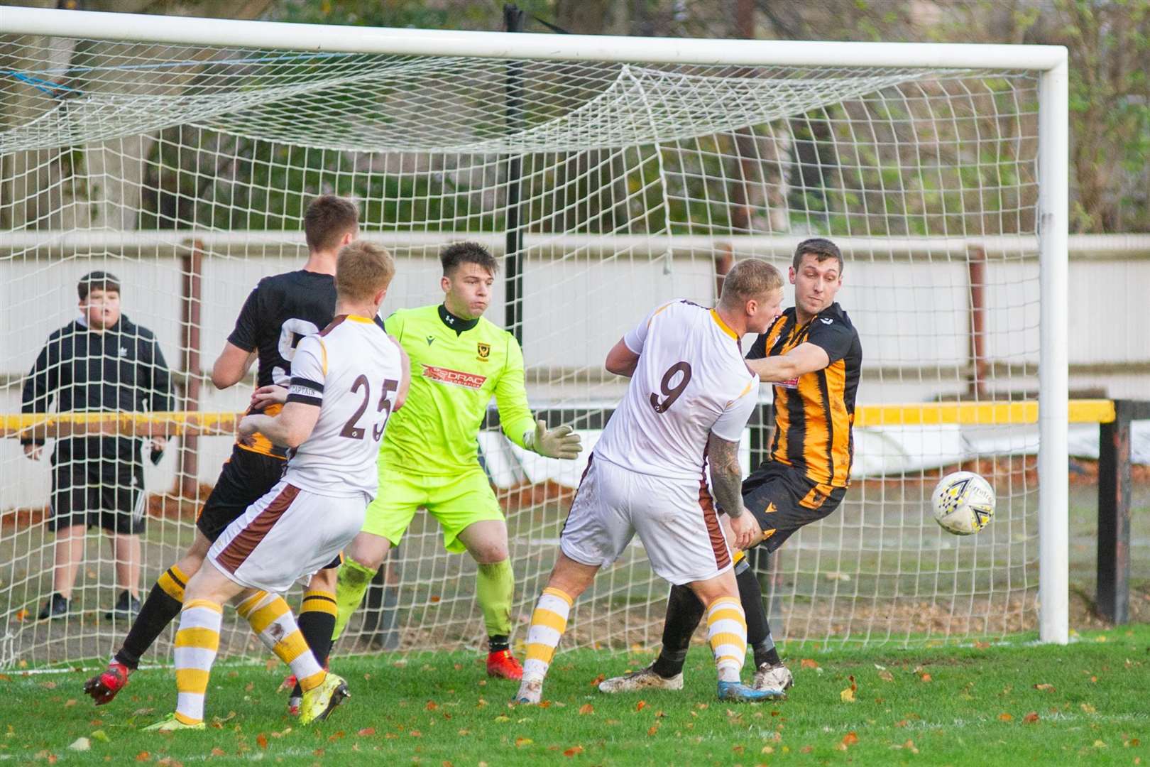 Action in the Huntly goalmouth. Picture: Daniel Forsyth..