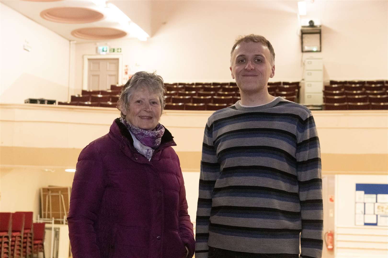 Lorna Creswell (left) and Ewen Watson demonstrating the view from the stage of (all be it empty) the town hall. Picture: Beth Taylor