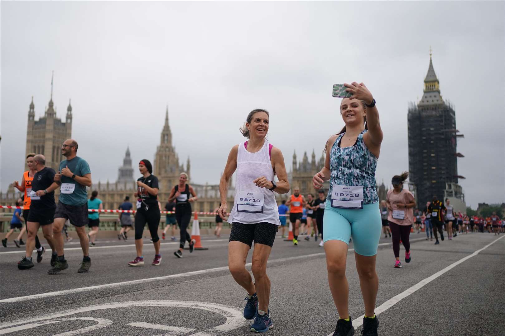 A runner takes a selfie on Westminster Bridge (Victoria Jones/PA)