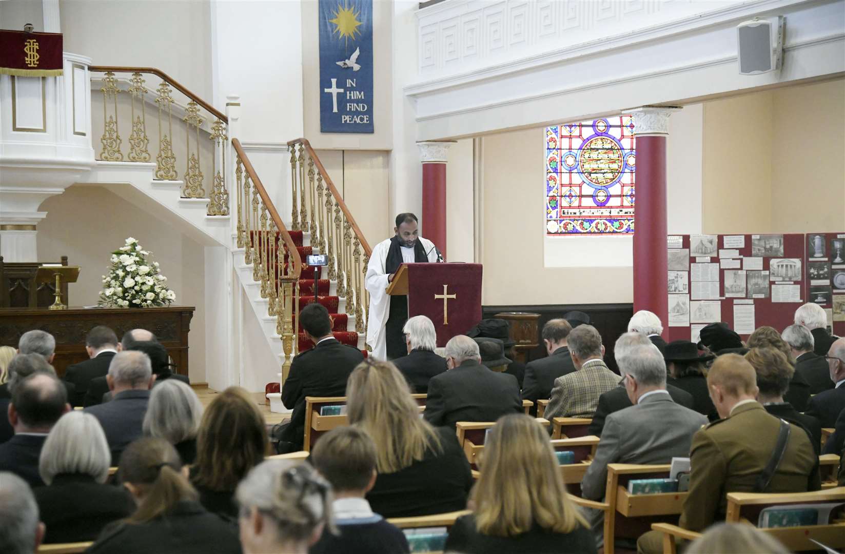 Reverend Dr Hamilton Inbadas from St John's Church in Forres reads a prayer. Picture: Beth Taylor.