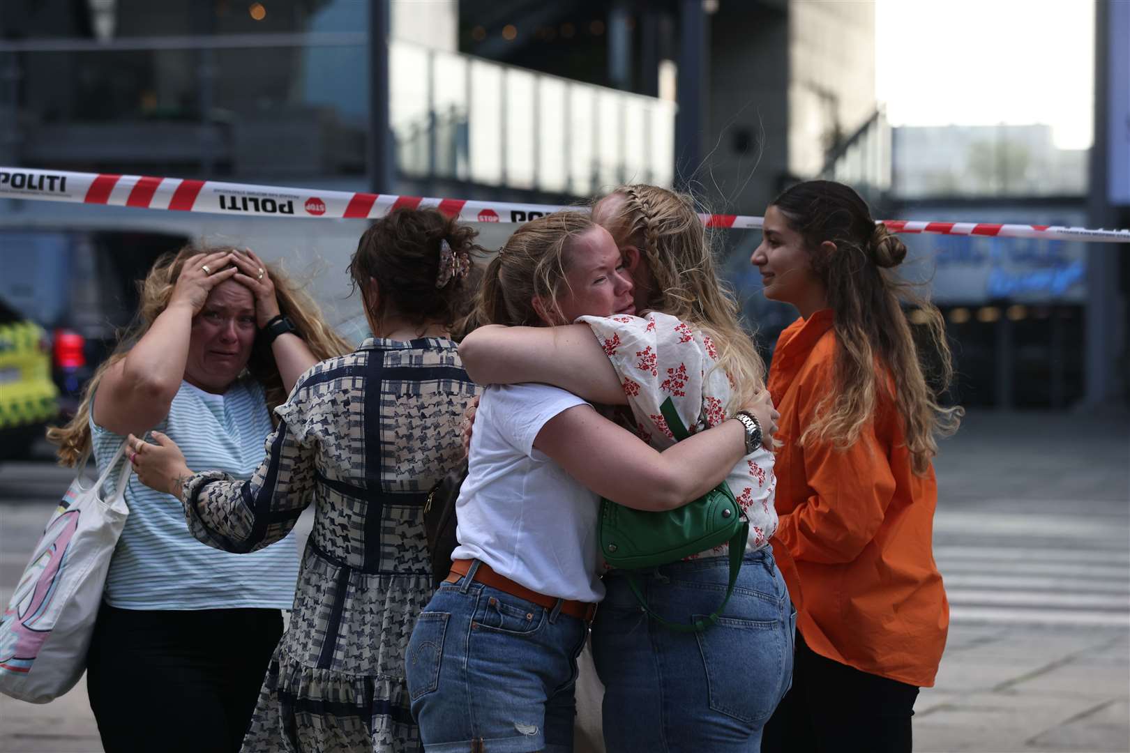 People react outside Field’s shopping centre in Copenhagen (Olafur Steinar Gestsson/Ritzau Scanpix via AP)
