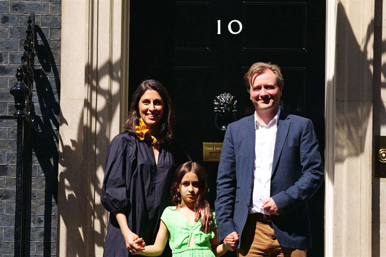 Ms Zaghari-Ratcliffe with her husband Richard and daughter Gabriella as they leave 10 Downing Street last year (PA)
