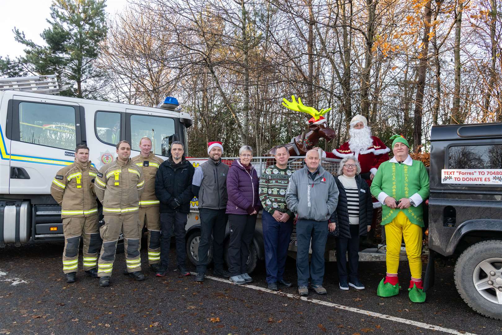 Santa and his volunteers ahead of their tour of Forres and Kinloss. Picture by Beth Taylor
