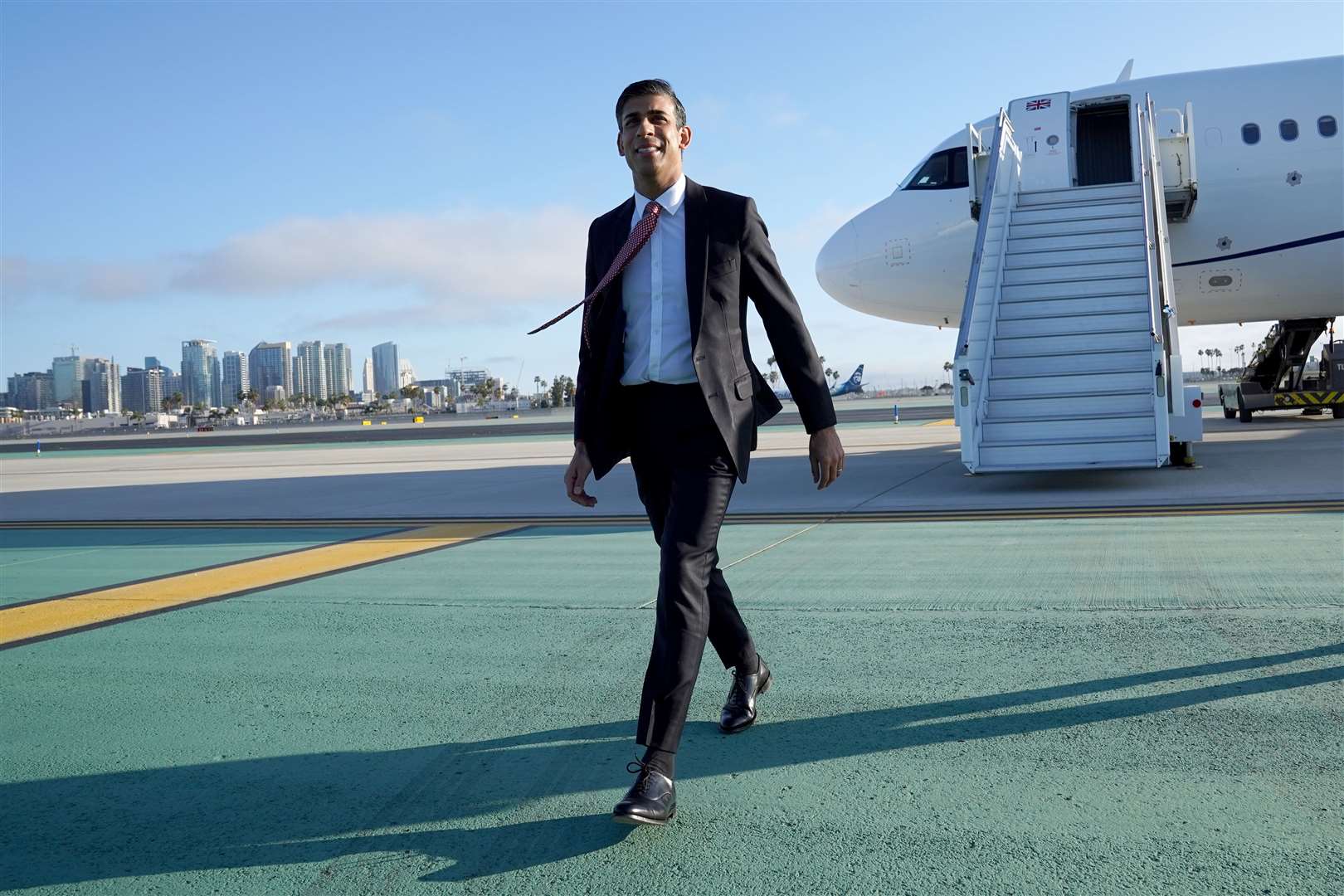 Prime Minister Rishi Sunak disembarks his plane as he arrives in San Diego (Stefan Rousseau/PA)