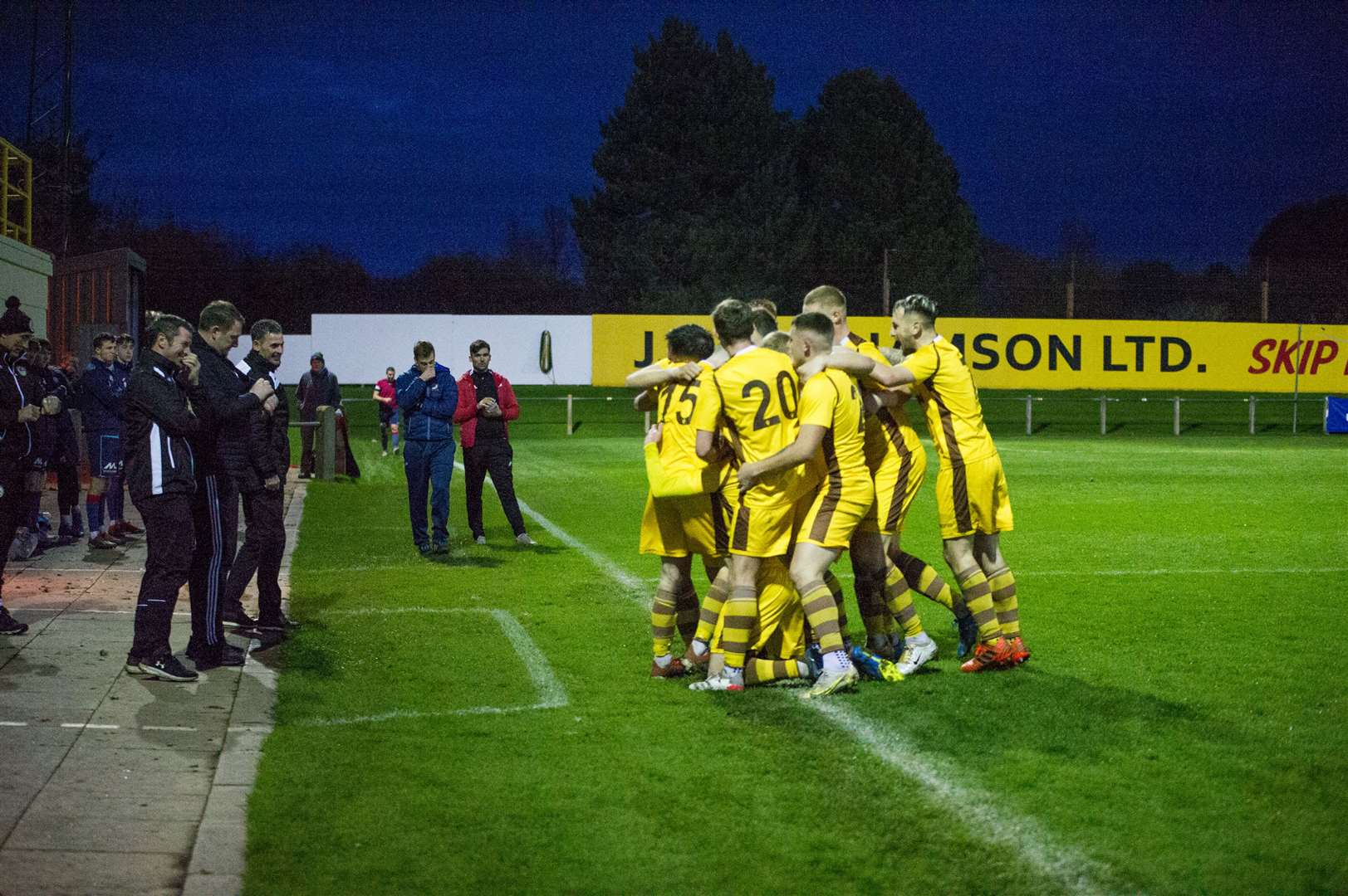 Forres players celebrate their second goal in front of Charlie Rowley and the Mechanics management team. Forres Mechanics v Turriff United at Mosset Park...Picture: Becky Saunderson..