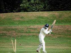 Howard Tolliday watches his stumps fly and is out for a duck as Forres hunt down the County batsmen on Saturday.