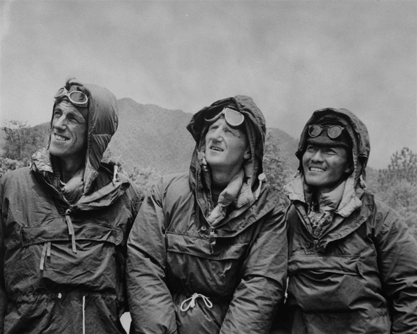 Edmund Hillary (left) and Sherpa Tenzing Norgay (right), with expedition leader Lord John Hunt (centre) in 1953 (PA)
