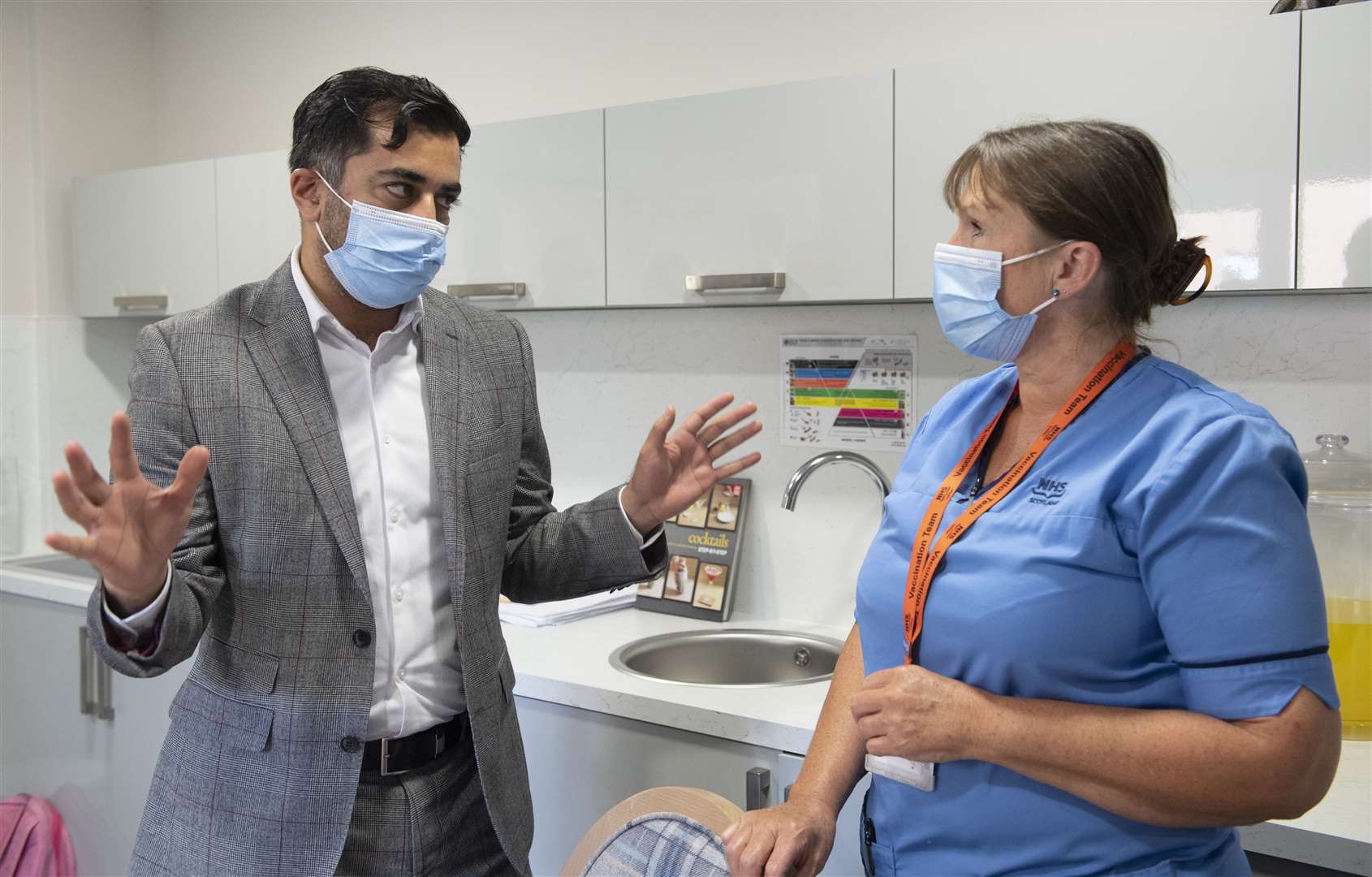 Humza Yousaf talks with nurse Laura Hastings at Victoria Manor care home (Lesley Martin/PA)