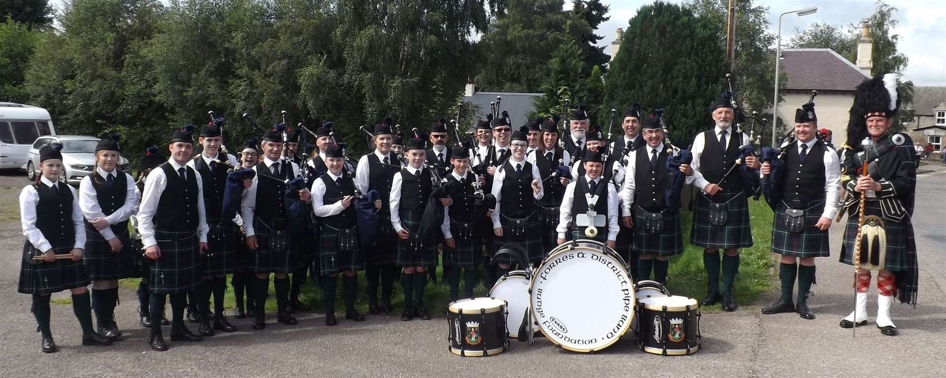 Forres and District Pipe Band including chairman John Channon (right) are looking forward to welcoming new tutors.