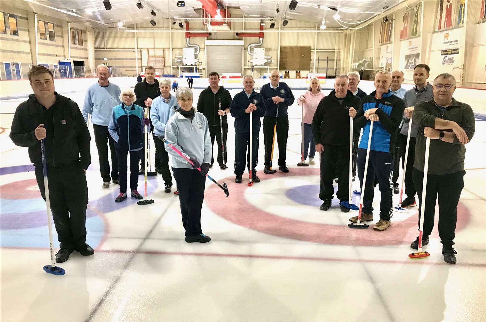 The Forres bonspiel particpiants, including the winning Forres quartet of Charlie Watt Jnr (fourth from left), Graeme Govan (second from left), Carol Bennett (sixth from left) and Julie Stewart (tenth from left).