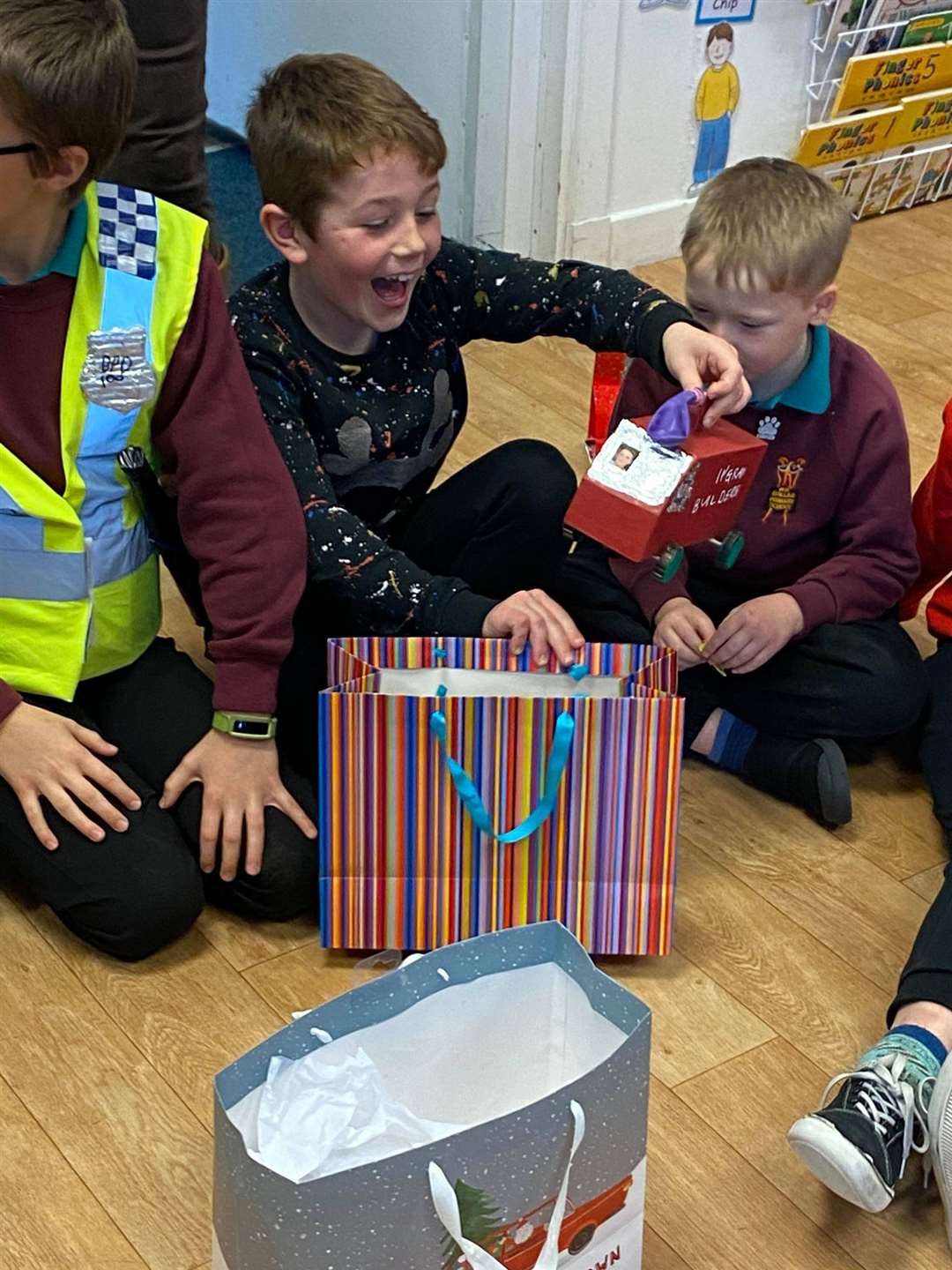 Fergus Ingram (P4) is chuffed with his present.