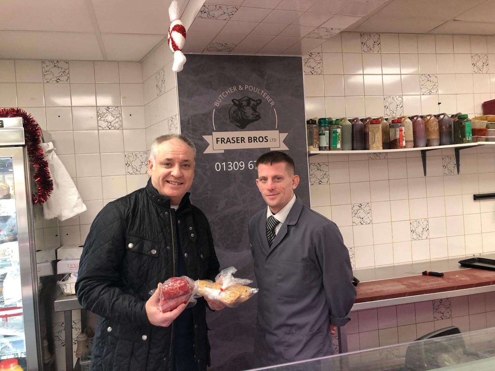 MSP Richard Lochhead with Niall from Fraser Bros Butcher.