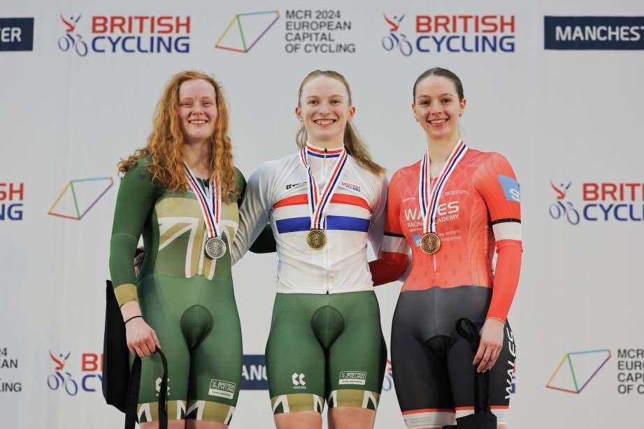 Lauren Bell (centre) with her second gold medal in Manchester. SWPix