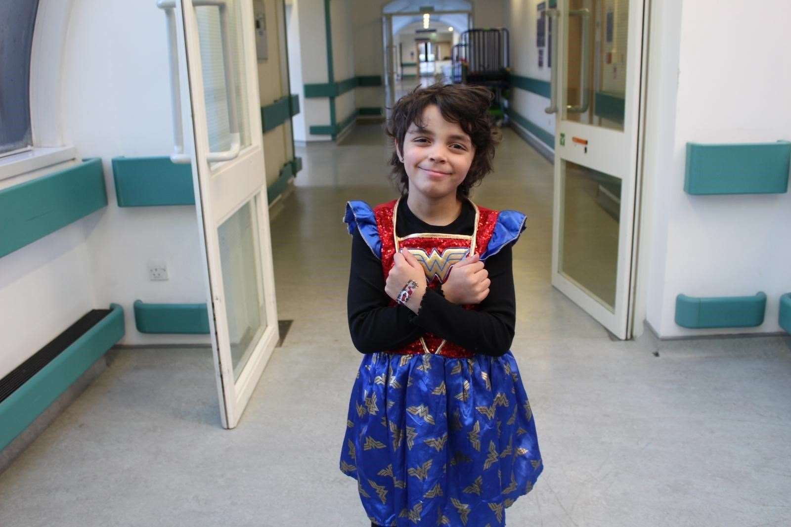 Arianna wore her Wonder Woman outfit during cancer treatment at Great Ormond Street Hospital to make her feel more confident (Family handout/GOSH Charity/PA)
