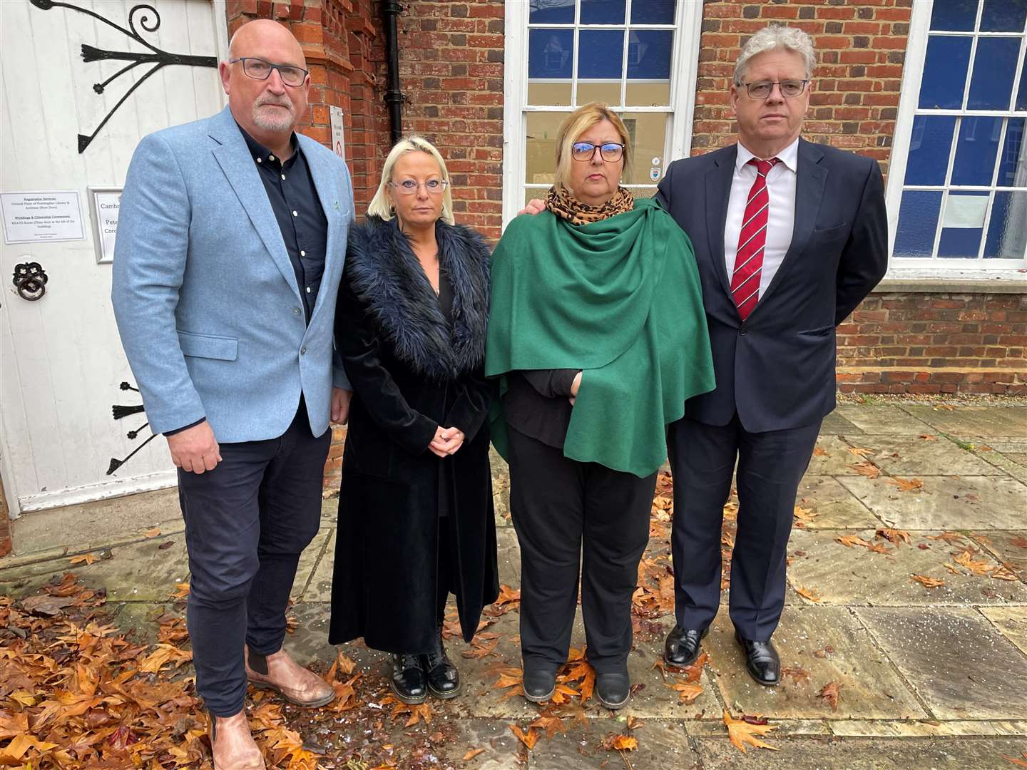 Family spokesman Radd Seiger, Harry Dunn’s mother Charlotte Charles, Jo Sullivan, mother of Raffy Tsakanika and Donal Sullivan, stepfather of Raffy Tsakanika outside a hearing in Raffy Tsakanika’s inquest (Sam Russell/ PA)