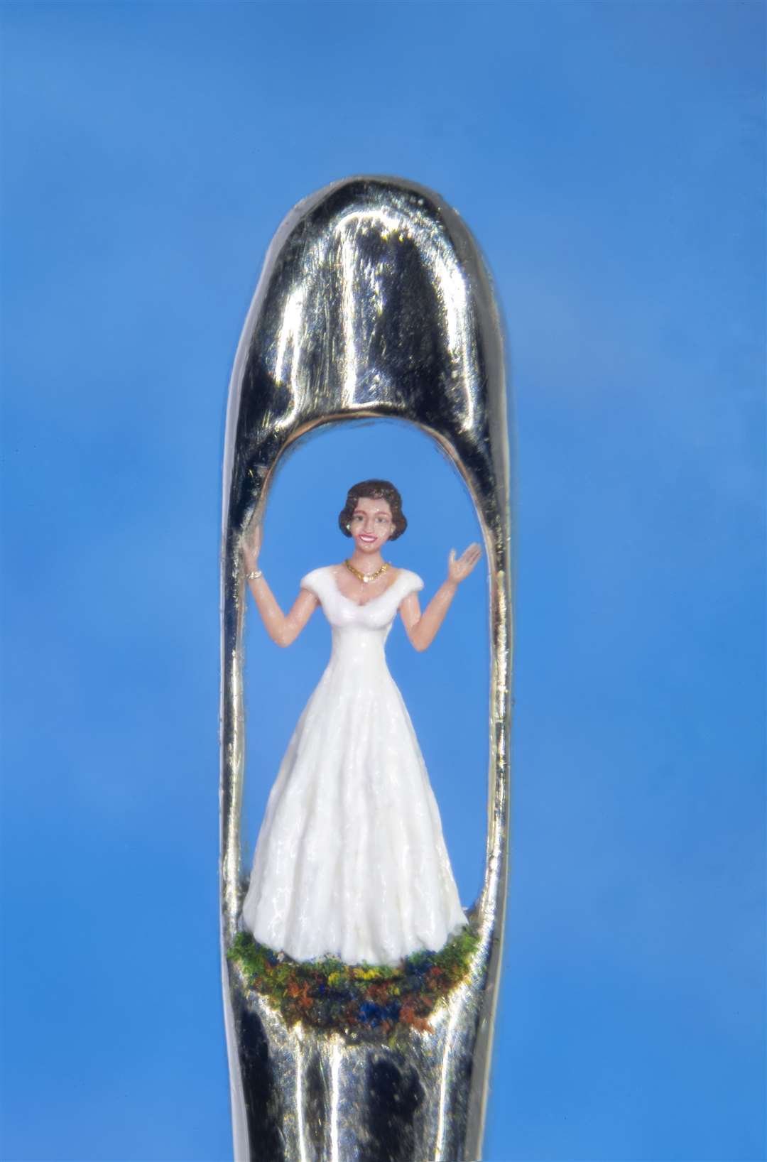 Dr Willard Wigan’s model of a young Queen Elizabeth inside the eye of a needle (Darren Shipman/Dr Willard Wigan/PA)