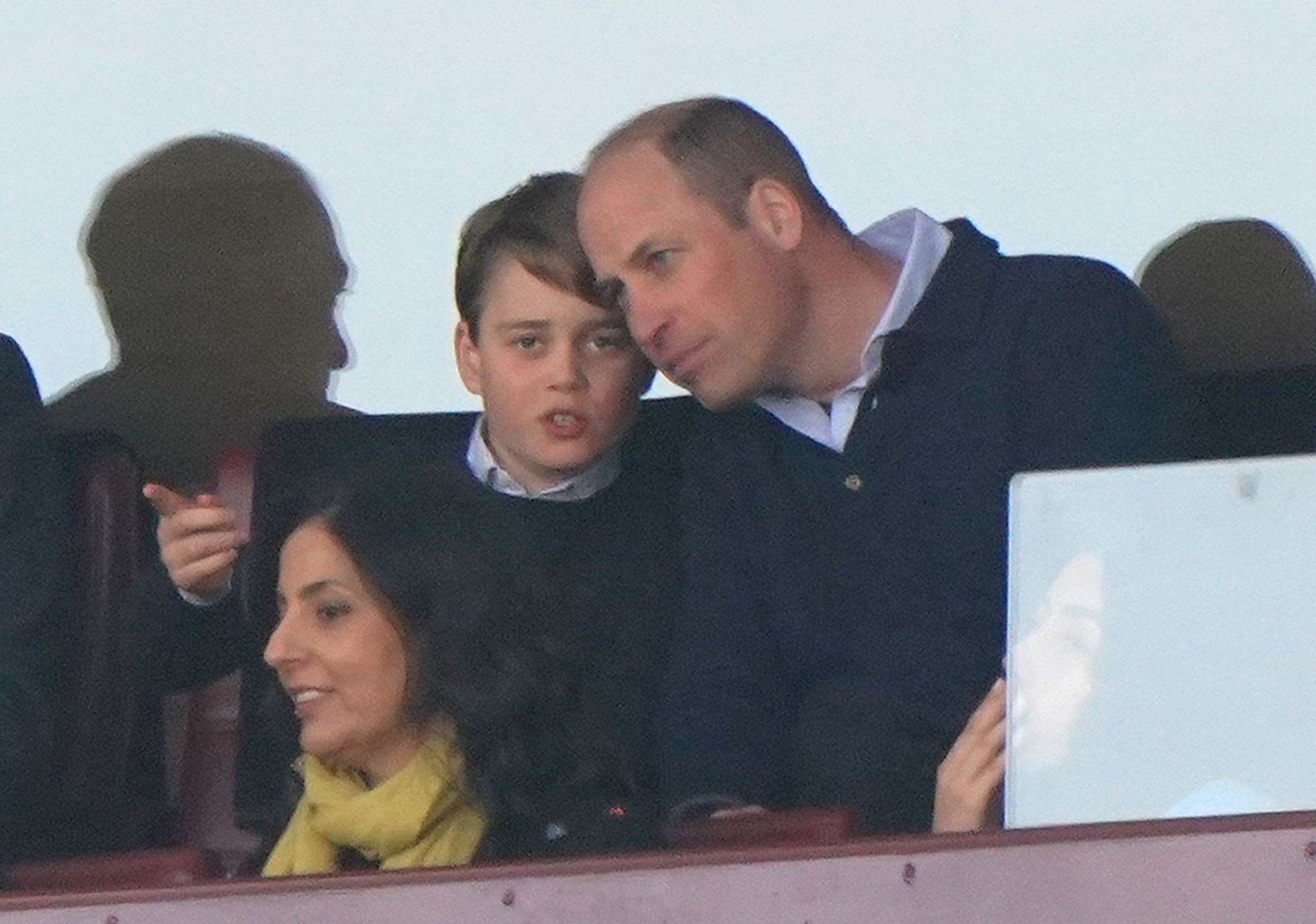 The Prince of Wales with Prince George of Wales at a previous Aston Villa match (PA)