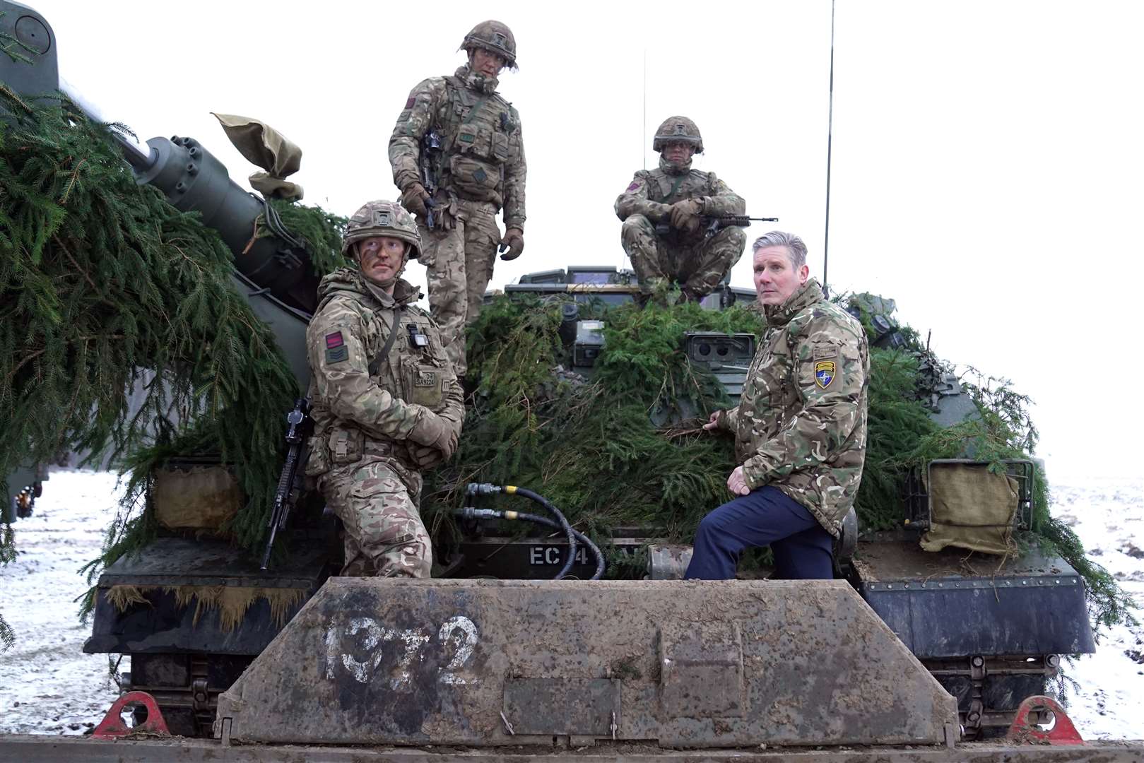 Labour leader Sir Keir Starmer on a military vehicle during his visit (Stefan Rousseau/PA)