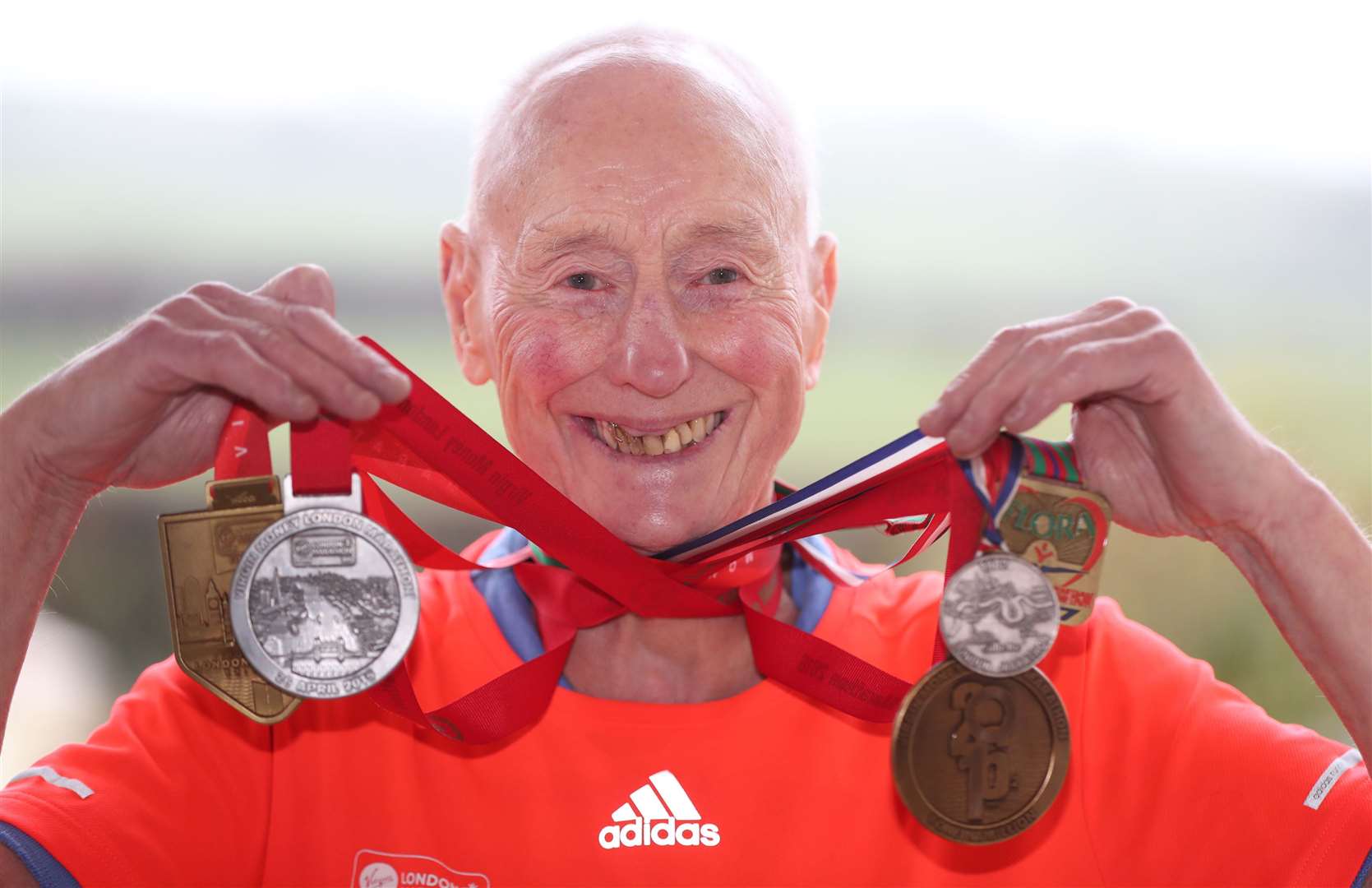 Ken Jones is pictured with some of his previous medals (Niall Carson/PA)