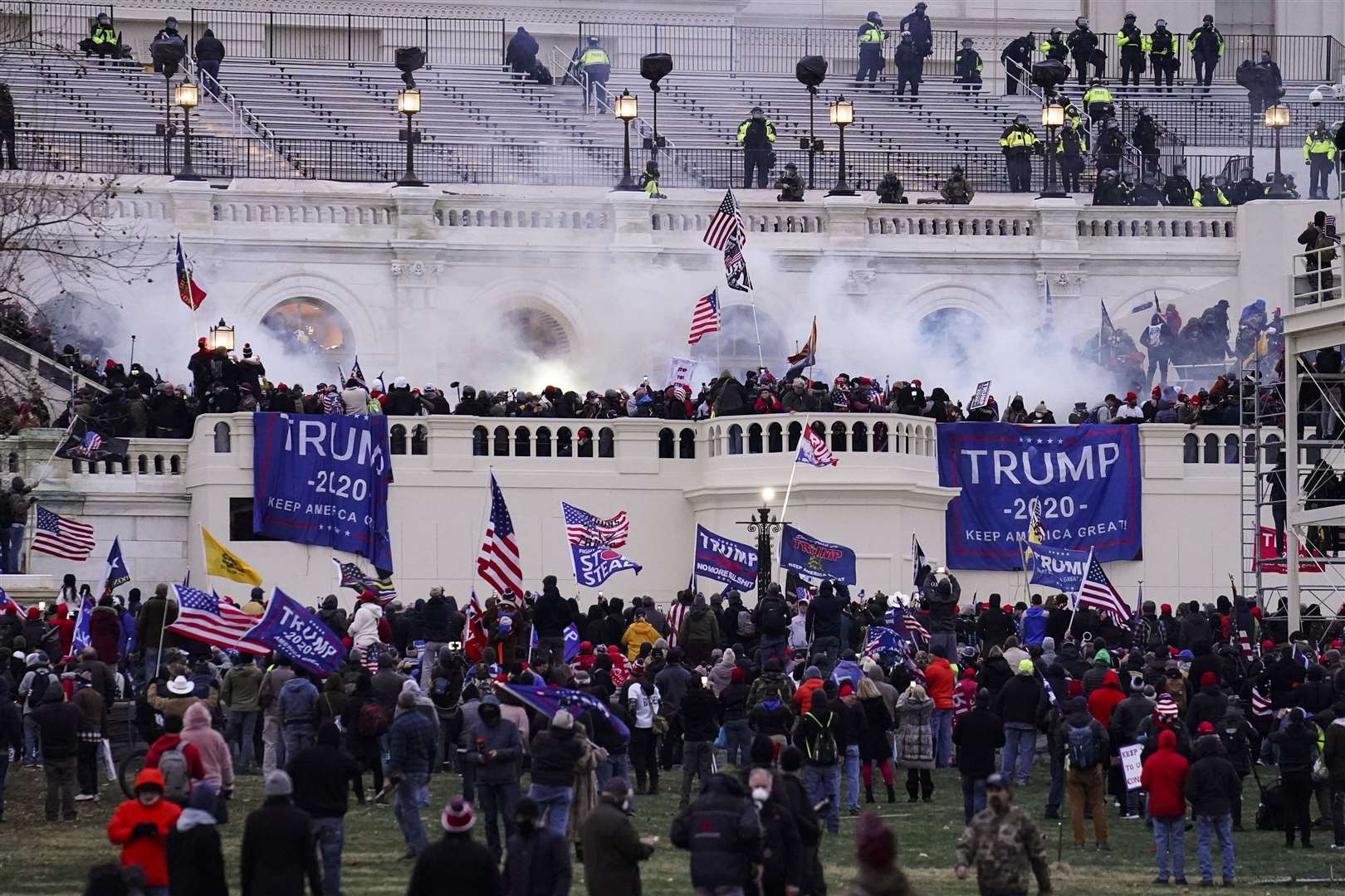 Violent protesters, loyal to President Donald Trump, storm the Capitol building on Wednesday (John Minchillo/AP)