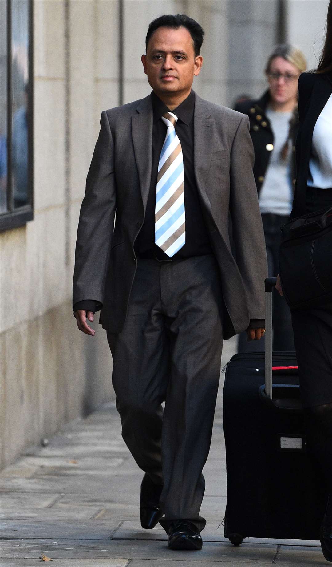 Dr Manish Shah arriving at the Old Bailey in London during an earlier trial (Kirsty O’Connor/PA)