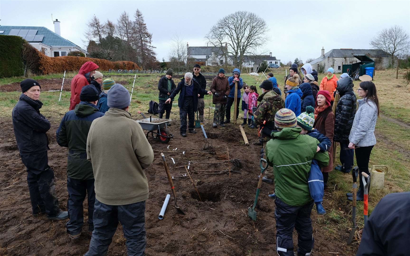 Nick Molnar of Forres Friends of Woods and Fields guided participants on the planting process.