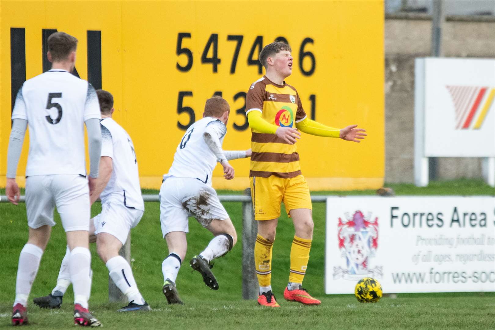 Forres Mechanics' forward Ethan Cairns after a missed chance for the home side. ..Forres Mechanics FC (0) vs Rothes FC (1) - Highland Football League 23/24 - Mosset Park, Forres 25/11/2023...Picture: Daniel Forsyth..