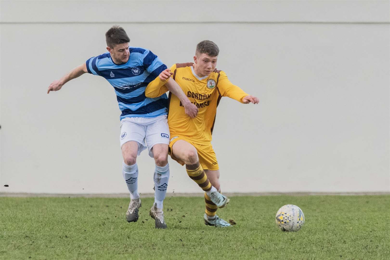 Banks O' Dee's Darryn Kelly and Forres Mechanics' Craig Mackenzie tussle to win the ball. ..Forres Mechanics F.C v Banks O' Dee F.C at Mosset Park...Picture: Beth Taylor.