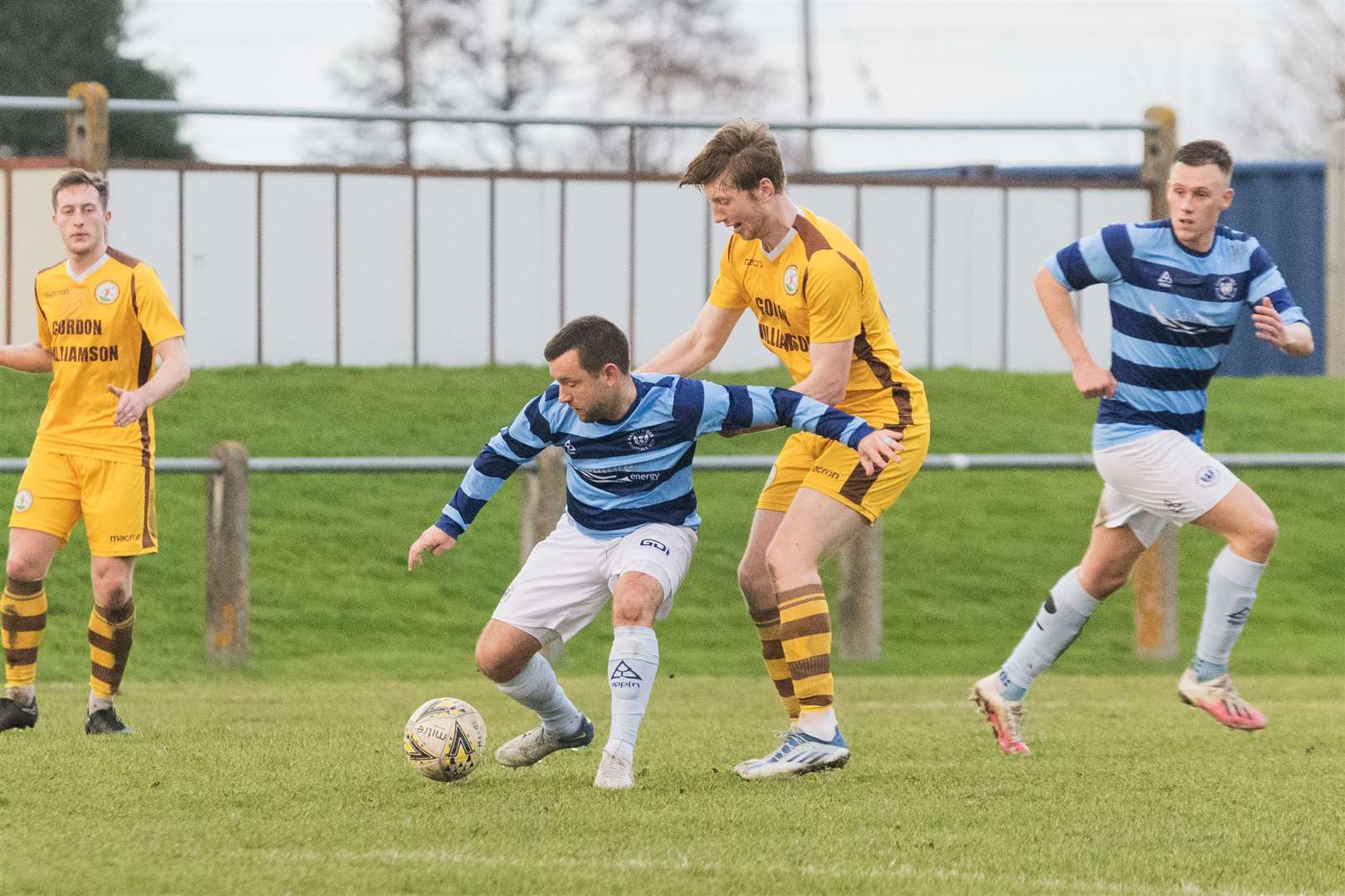 Banks O' Dee's Neil Gauld blocking Forres Mechanics' Connall Ewan from the ball. ..Forres Mechanics F.C v Banks O' Dee F.C at Mosset Park...Picture: Beth Taylor.