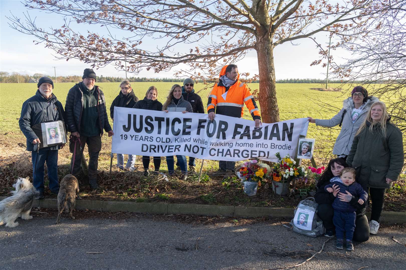 Fabian's Mum, Dad and others who walked from Forres to the layby near Brodie to commemorate the tragic loss four years on. Picture: Beth Taylor