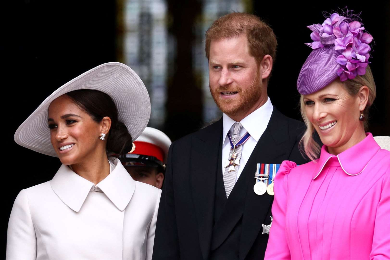 The Duke and Duchess of Sussex and Zara Tindall leaving the service (Henry Nicholls/PA)