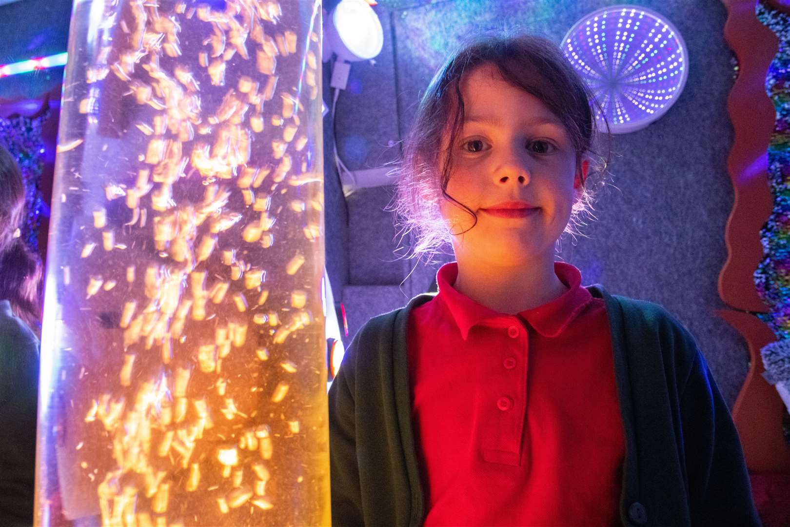 All lit up - Hallie Morgan in the Out There mobile sensory room.